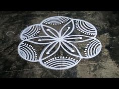 an intricately designed design is shown on the ground