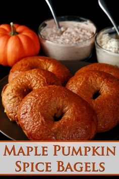 maple pumpkin spice bagels on a plate with spoons and dip in the background