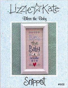 a cross - stitch pattern for a baby's birth is displayed in a frame