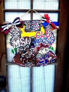 the door is decorated with many different things on it's front window sill