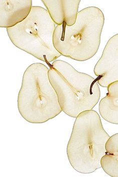 sliced apples are shown on a white background