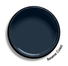 a dark blue plate with the word freshen coast written on it in black ink