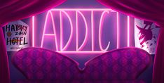 a pink neon sign that reads aids on the side of a purple couch in front of a red curtain