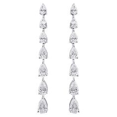 Refreshing your style statement one trend at a time. A scintillating mix of pear cut diamonds set in 14 kt white gold. Gold- 3.31 gms Diamond- 2.52 carats Diamond Colour: G Diamond Clarity: SI Earring Weight: 3.83 gms PLEASE ALLOW 5-10% VARIATION Formal Teardrop Single Cut Diamond Earrings, Platinum Pear-shaped Diamond Earrings For Formal Occasions, Luxury Pear-shaped Single Cut Diamond Earrings, Formal Pear-shaped Diamond Earrings With Single Cut Diamonds, Timeless Pear-shaped Diamond Earrings For Formal Occasions, Pear-shaped Diamond Earrings For Formal Events, Diamond White Brilliant Cut Pear-shaped Earrings, White Gold Pear-shaped Diamond Earrings For Formal Events, White Gold Pear-shaped Diamond Earrings For Formal Occasions