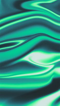 an abstract image of wavy lines in green and blue