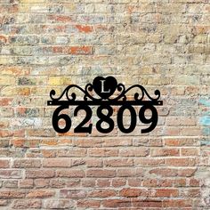 a metal sign on the side of a brick wall that says, i love 6300