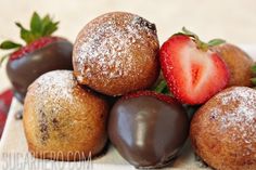 chocolate covered strawberries and pastries on a plate