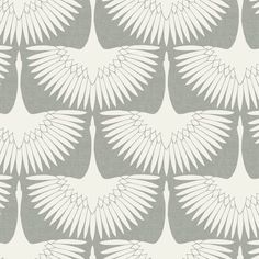 a white and gray wallpaper pattern with large leaves on the back side of it