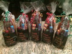 five bags of candy sitting on top of a counter