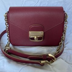 Auth Longchamp Le Pliage Heritage Red Saffiano Leather Shoulder Crossbody Bag With Gold Hardware. Very Good Used Condition. Two Small Scratches On Backside Of Bag (Pictured And Circled). No Odors Or Stains. Will Come With Original Dustbag, Care Card, And Tags From Purchase. Longchamp Crossbody Bag, Longchamp Crossbody, Longchamp Handbags, Longchamp Bags, Care Card, Longchamp Le Pliage, Red Gold, Gold Hardware, Bags Handbags