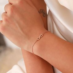 Tiny Infinity Bracelet, 14K Solid Gold Infinity Bracelet, Dainty initial Love Bracelet, Handmade Gold Anniversary Bracelet, Gift For Her, Summer Jewelry, Anniversary Bracelet, Birthday Gift, Christmas Gift, Solid Gold Bracelet, Minimalist Gold Bracelet, Wedding Bracelet, Valentine's Day Gift "Material: SOLİD GOLD (No Gold Filled Or No Gold Plated)" "KARAT: 14K (585) "Bracelet Length: 13 MM "Bracelet Width: 5 MM "Available Gold Color: (Yellow Gold, White Gold, Rose Gold) "The certificate will be Elegant Infinity Jewelry For Friendship, Elegant Rose Gold Chain Bracelet For Friendship, Rose Gold Infinity Bracelets For Friendship, Elegant Rose Gold Name Bracelet For Friendship, Elegant Rose Gold Bracelets For Friendship, Elegant Rose Gold Friendship Bracelet, Dainty Infinity Bracelets For Friendship, Dainty Infinity Bracelet For Friendship, Elegant Rose Gold Infinity Bracelet