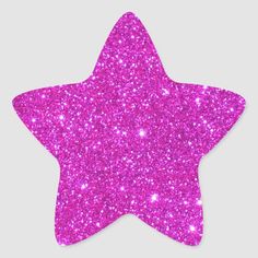 a red glitter star sticker on a white background