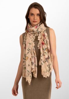 Immerse yourself in the enchanting beauty of this Heyday floral print scarf, crafted from a tactile blend of modal and silk. Uplifted with a skilfully hand crafted scalloped beige lace border in a bold leaf design, this scarf is an exquisite fusion of nature-inspired elegance and comfort. The lightweight and silky feel of the modal and silk blend caresses your senses whilst the floral print creates a delicate interplay of patterns. Versatile and cozy, this scarf can be draped gracefully over the Gifted Hands, Lace Border, Scarf Print, Leaf Design, Silk Scarf, Nature Inspired, Occasion Wear, Headpiece, Nature Inspiration