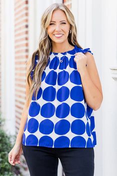 Stay cool and stylish in our Calm Before The Score Top! This sleeveless top features playful ruffle details on the neckline and shoulders, adding a touch of whimsy to your look! The fun polka dot print adds a pop of color, making this top perfect for any casual outing! 100% Polyester The Score, Color Making, Model Fits, Polka Dot Print, Stay Cool, Dot Print, Royal Blue, Polka Dot, Color Pop