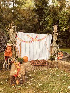 a hay bale with fall decorations on it