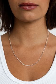 Life is too short to wear boring jewelry. With Harlow, you get the classic feel of a chain necklace, with a modern twist in design. Intricate detailing gives this piece a fresh, luxe feel for everything from cocktail parties to jeans and tees. Add your favorite charm to complete your look. Sterling silver 3mm chain width Available in 3 lengths Minimalist Silver Chain Necklace For Party, Trendy Silver Chain Necklace For Formal Occasions, Sterling Silver Adjustable Chain Necklace For Party, Sterling Silver Necklace With Delicate Chain For Party, Chic Silver Chain Link Jewelry, Trendy Sterling Silver Snake Chain Necklace, Chic Silver Chain Necklace As Gift, Chic Silver Chain Necklace Gift, Chic Silver Chain Necklace For Gift