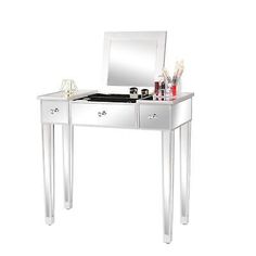 a white vanity table with drawers and a mirror on it's side, in front of a white background