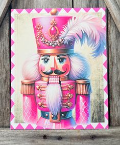 a painting of a nutcracker wearing a pink outfit