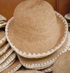 We took our best selling natural bucket hat and added a white starlet trim. This minimal vegan bucket hat that will surely become a staple in your wardrobe. A cute, packable hat made by hand and in small batches by our talented women artisan group, this will be your new favorite companion for sunshine-soaked days. Made by hand from naturally-dyed, cabuya plant fiber. Style Notes Plant Dyed & Crocheted Natural Fiber Moveable 3-4" brim Flexible elastic inner band for the best fit 100% crafted by h Natural Brimmed Bucket Hat For Everyday, Natural Brimmed Everyday Bucket Hat, Eco-friendly Brimmed Bucket Hat In Natural Color, Eco-friendly Brimmed Natural Bucket Hat, Natural Bucket Hat With Short Brim For Everyday, Handmade Bucket Hat With Curved Brim In Natural Color, Handmade Natural Bucket Hat With Curved Brim, Handmade Natural Brimmed Bucket Hat, Summer Bucket Hat