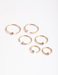 Complete your look with faux body jewellery — no piercings necessary! This diamante faux nose ring is an uber-cute and commitment-free accessory! | Lovisa Gold Diamante Faux Ring Faux Nose Ring, Face Jewels, Gold Sun, Layered Chains, Chain Anklet, Anklet Bracelet, Body Jewellery, Favorite Rings, Infinity Bracelet