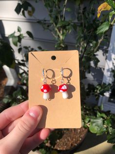 Mushrooms on silver huggies Silver Huggies, Beaufort Sc, Jewelry Earrings Dangle, Dangle Drop Earrings, Stuffed Mushrooms, Dangle Earrings, United States, Drop Earrings, Red