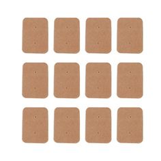 six pieces of cardboard with holes in the middle