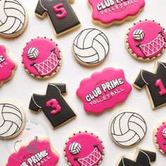 cookies decorated to look like volleyball uniforms and shirts with the number one on each cookie