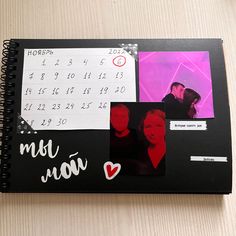 a photo album with photos and writing on it, next to a date book that says may moon