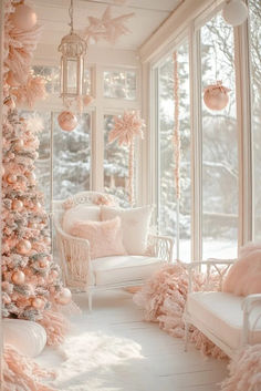 a white room decorated for christmas with pink decorations