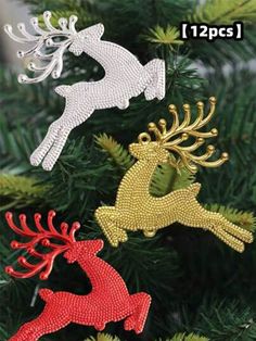 three christmas ornaments hanging from a tree