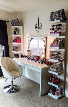 an image of a room with many items on the desk and in front of it