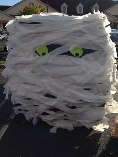 a close up of a person's face made out of paper