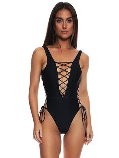 Discover Luli Fama's favorite one piece swimsuit, designed to make a statement. Its super sexy plunging lace-up center detail adds a captivating touch, while side adjustments allow you to customize the fit to your liking. The keyhole cutout back adds a hint of allure, and the chic ribbed fabric design adds a stylish element to this stunning swimsuit. Whether you're lounging by the pool or strolling along the beach, this one piece is sure to make waves and turn heads.
 Size: XS, S, M, L, XL One-piece Swimwear With Lace-up Back For Summer, Summer One-piece Swimwear With Lace-up Back, One-piece Swimwear With Lace-up Back For Pool, One-piece Lace-up Back Swimwear, Fitted Beachwear Swimwear With Lace-up Back, Fitted Lace-up Back Beachwear Swimwear, Poolside Backless Swimwear With Lace-up Back, Lace-up Backless Swimwear For Poolside, Backless Lace-up Swimwear For Poolside