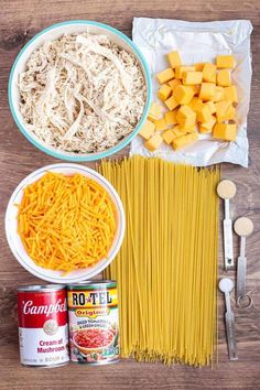 pasta, cheese, and other ingredients laid out on a table to make an appetizer