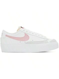 Nike 
White & Pink Blazer Low Platform Sneakers 
Low-top buffed leather sneakers in white and pink. 
. Suede cap toe 
. Lace-up closure 
. Raw edge at padded tongue 
. Padded collar 
. Logo printed at heel tab 
. Swoosh appliqué at sides 
. Mesh lining 
. Textured rubber platform midsole 
. Treaded rubber sole 
. Platform: H1.5" 
Please note that this item may be shipped only within North America. 
Supplier color: White/Pink glaze 
Upper: leather. Sole: rubber. 
Made in Indonesia. 
241011F128038 Casual Athletic Shoes, Blazer Low, Outdoor Bag, Casual Sneakers Women, Casual Athletic, Pink Blazer, Womens Athletic Shoes, Nike White, Pink Suede