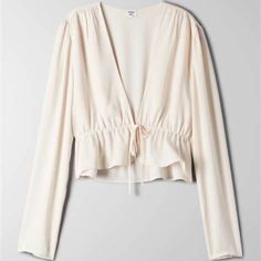 Ivory ‘Sweet Cream Crme Secree’ Cropped Long Sleeve Blouse With Tie Front Closure. Size Medium. 17" Pit To Pit, 17.5" Length. Nwt No Flaws. Fall Bottoms, Sweet Cream, Gathered Sleeves, Tie Front Blouse, Peplum Blouse, Peplum Hem, Tie Blouse, Accessories Jacket, Crepe Fabric