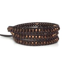 "This is a beautiful brown Bohemian beaded wrap bracelet and it would make the perfect Valentines Day gift for that special person in your life. If you're looking for a brown wrap bracelet to complete your favorite outfit you can't go wrong with this wrap bracelet. It is comfortable enough to wear all day at work and leave it on for a night out. You'll never want to take it off. This wrap bracelet is made with top quality leather cord and Czech glass beads in dark bronze. This bracelet measures Brown Beaded Braided Bracelet For Festivals, Adjustable Brown Beaded Friendship Bracelets, Hand Wrapped Brown Braided Bracelets For Gift, Hand Wrapped Brown Braided Bracelet Gift, Bohemian Brown Leather Bracelet Hand Wrapped, Bohemian Hand Wrapped Brown Leather Bracelet, Spiritual Brown Bracelets For Festivals, Spiritual Brown Bracelet For Festivals, Brown Hand Wrapped Beaded Bracelets For Festivals