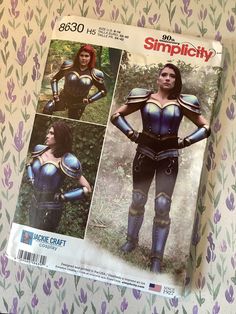 an image of a woman in armor on the cover of a sewing pattern for a costume