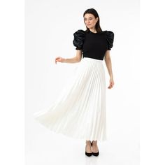 G-Line White Pleated Maxi Skirt Elastic Waist Band Ankle Length Skirt The beautiful pleated maxi skirt is an ideal length and style for the warmer months, with the option to wear it over the top for a more relaxed look, or with a belt to keep the waistline in check. It features a comfortable elasticated waistband and long flowing drapes which sit neatly around your legs. The skirt has a classic A-line silhouette and is finished with ruffle detailing at the hem. Pair with a chunky sweater and str Evening Pleated Voluminous Maxi Skirt, Elegant Pleated Full Skirt Maxi Dress, Elegant Maxi Dress With Pleated Full Skirt, Voluminous Skirt With Pleated Hem For Party, Spring Maxi Dress With Pleated Relaxed Skirt, Flowy Party Maxi Skirt With Pleated Hem, Pleated Flared Maxi Skirt For Evening, Chic Maxi Dress With Pleated Full Skirt, Chic Full-skirt Maxi Dress With Pleated Details