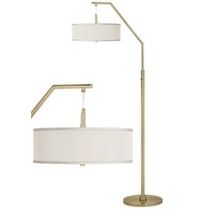 a floor lamp with a white shade on the bottom and a gold metal pole underneath it