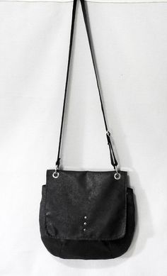 "A great shoulder bag in glam rock / vintage style, made of a luxurious version of Alcantara suede - a thick fabric with excellent usability parameters - resistant to dirt and abrasion. This suede is \"aged\", in places shimmering, black dappled. The inside of the bag also with Alcantara. The whole is closed on the zipper. The whole purse is stiffened and strengthened with the insulation - keeps the cut without filling. The belt is 3cm wide, adjustable. The bag will accommodate all necessary fem Gothic Shoulder Bag For Everyday Use, Black Grunge Crossbody Shoulder Bag, Grunge Rectangular Shoulder Bag For Everyday Use, Black Grunge Shoulder Bag With Adjustable Strap, Gothic Tote Shoulder Bag For Everyday Use, Alternative Leather Bags With Adjustable Strap, Alternative Leather Bag With Adjustable Strap, Gothic Shoulder Bag For Daily Use, Gothic Shoulder Bag With Gunmetal Hardware For Everyday Use