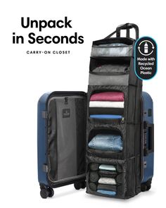 an open suitcase with clothes in it and the words, unpack in seconds carry - on closet