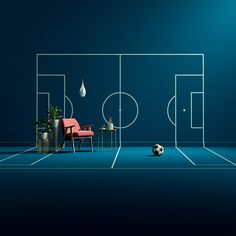 a blue room with a soccer field and chair