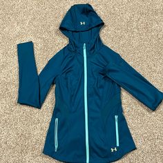 Under Armour Light Running Jacket Women’s Size Xs Never Used New Without Tags Under Armour Hooded Outerwear For Outdoor Activities, Hooded Under Armour Outerwear For Outdoor Activities, Under Armour Casual Winter Outerwear, Casual Under Armour Winter Outerwear, Blue Athleisure Outerwear With Pockets, Under Armour Long Sleeve Winter Windbreaker, Under Armour Long Sleeve Outdoor Outerwear, Under Armour Winter Outerwear With Pockets, Under Armour Outerwear For Fall Outdoor Activities