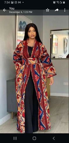 A beautiful kimono that would become your favorite,it's perfect for movies,dinner,weddings and everywhere! please note that exact fabric might not be available,but be rest assured that we will provide similar options. made to order for you, customizations are welcome.  made with 100% cotton  care: share more Ankara Kimono Style, Kimono Ankara, Long Kimono Jacket, Kimono Styles, African Print Kimono, Ankara Kimono, Ankara Jackets, Ankara Tops, Modern Kimono