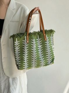 Elevate your beach day style with our Summer Chic Straw Fringed Tote Bag. Made from high-quality straw and featuring playful fringe details, this tote is both fashionable and functional. Perfect for storing your beach essentials, this bag is a must-have for any summer adventure. Color : Green Strap Type : Double Handle Details : Fringe Bag Size : Large Style : Vacation Type : Shoulder Tote Bag Closure Type : Buckle Pattern Type : Colorblock Features : High-capacity Material : Polyester Compositi Trendy Handwoven Bucket Bag, Green Crochet Bag For Beach Shopping, Trendy Woven Beach Bag, Green Crochet Bag For Beach Season Shopping, Trendy Handwoven Bags For Vacation, Trendy Beach Shoulder Bag With Tassels, Trendy Woven Bucket Bag For Beach Season, Trendy Woven Bucket Bag For Vacation, Green Beach Bags For Spring