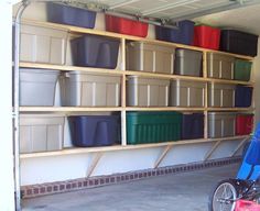 a bike parked in front of a garage filled with plastic containers