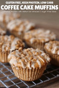 there are muffins on the cooling rack with icing