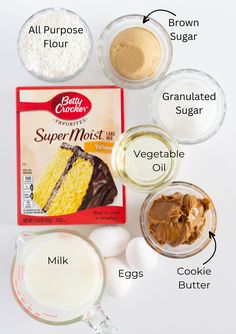 ingredients needed to make an easy cake recipe including eggs, milk, sugar and chocolate