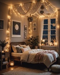 a bedroom with lights strung from the ceiling and a bed in front of a window